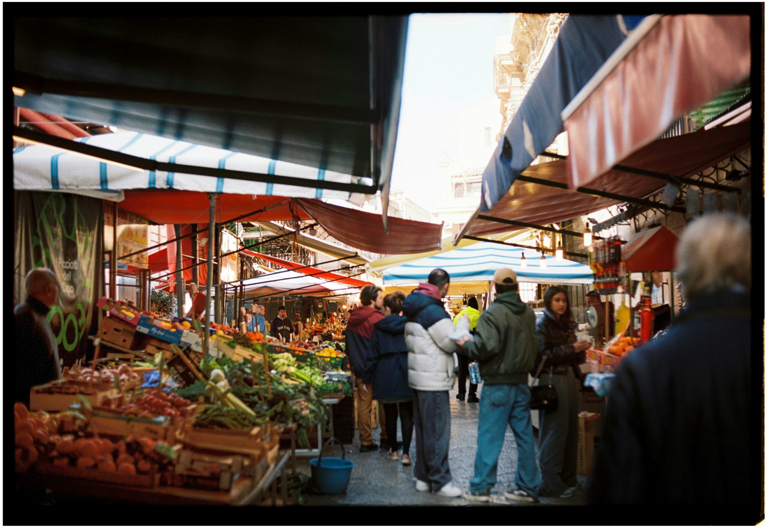 Film Photo of a Crowded Food Market in City