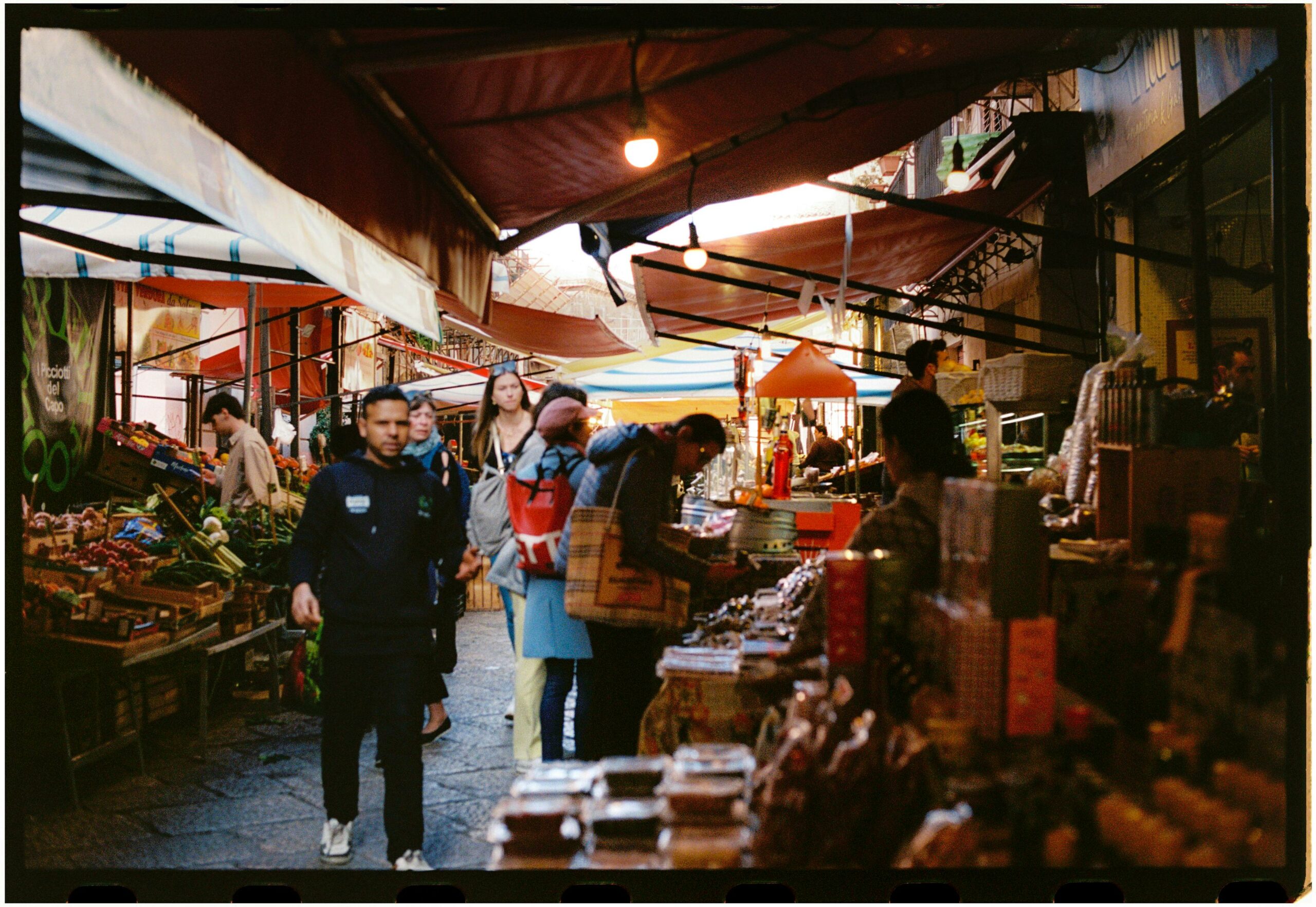 Film Photo of a Crowded Food Market in City